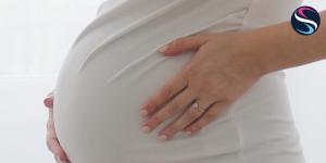You can use your wedding ring to figure out your baby’s gender